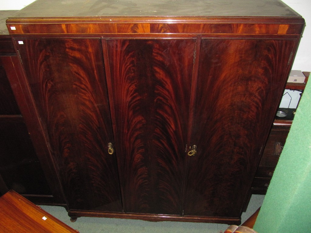 Appraisal: Mahogany triple door wardrobe and a double door wardrobe