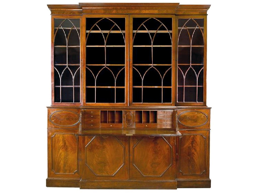 Appraisal: A GEORGE III MAHOGANY BREAKFRONT LIBRARY BOOKCASE in the manner