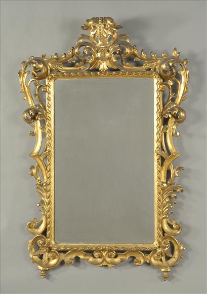 Appraisal: A Florentine carved giltwood wall mirror in mid- th century