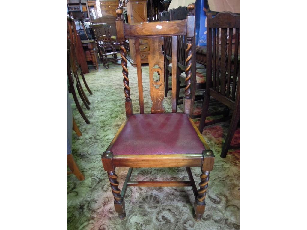 Appraisal: A set of four 's stained beechwood dining chairs with