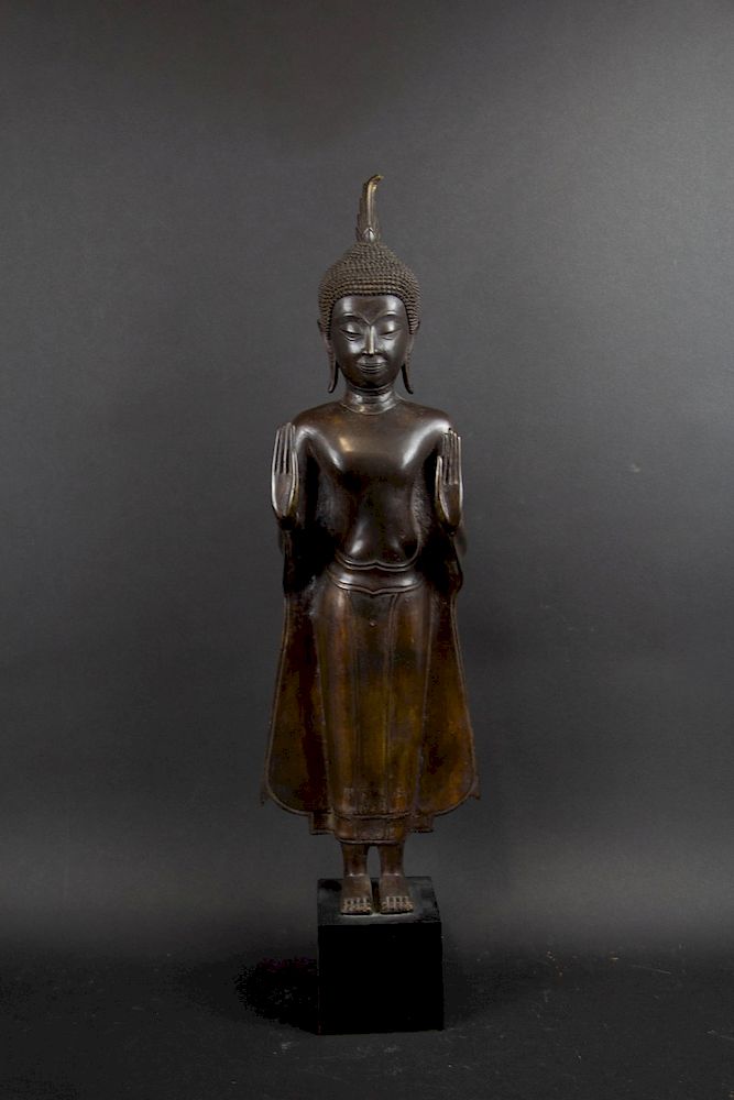 Appraisal: A Bronze Sukhothai Style Figure of Buddha Standing with both