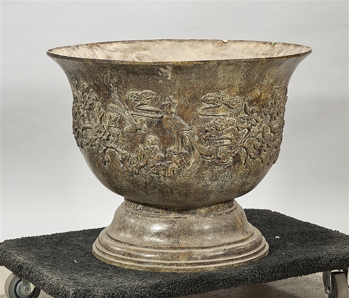 Appraisal: Chinese bronze jardiniere decorated with birds and flowers in relief