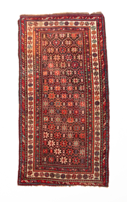 Appraisal: CAUCASIAN RUG Early th century Multiple borders star ground Pile