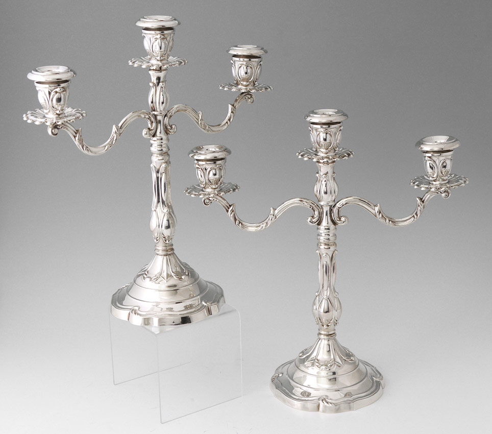 Appraisal: PAIR OF STERLING SILVER CANDELABRA Pair embossed light weighted candelabra