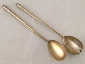 Appraisal: A pair of late Victorian silver salad servers with taper