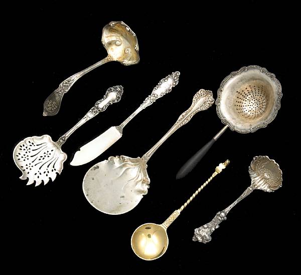 Appraisal: A group of sterling flatware Comprising gilt condiment spoon with