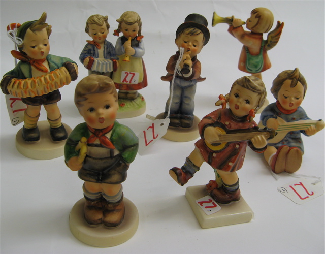 Appraisal: SEVEN GERMAN HUMMEL FIGURINES Accordion Boy HUM - H TM-