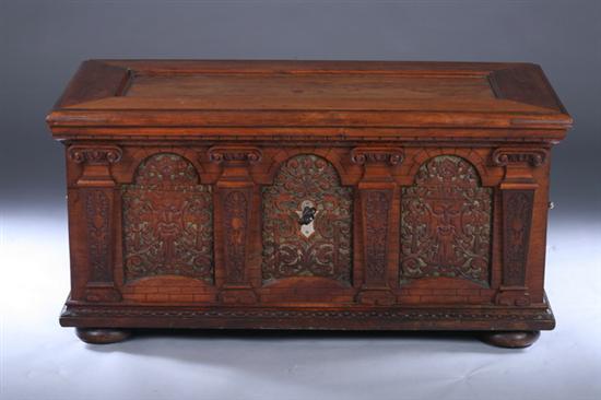 Appraisal: CONTINENTAL CARVED WALNUT BLANKET CHEST th century Dove-tailed construction panel