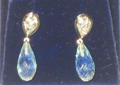 Appraisal: A PAIR OF AQUAMARINE AND DIAMOND EARRINGS comprising ct white