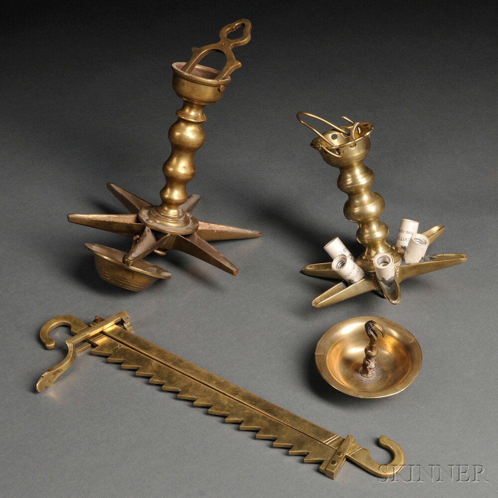 Appraisal: Two Polish Bronze Hanging Sabbath Lamps th century six-pointed oil