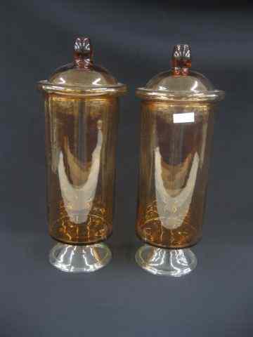 Appraisal: Pair of Apricot Colored Glass Apothecary Jars clear bases ''