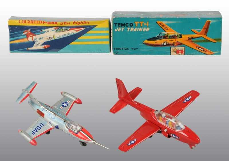 Appraisal: Lot of Tin Airplane Friction Toys Description Japanese Working Includes