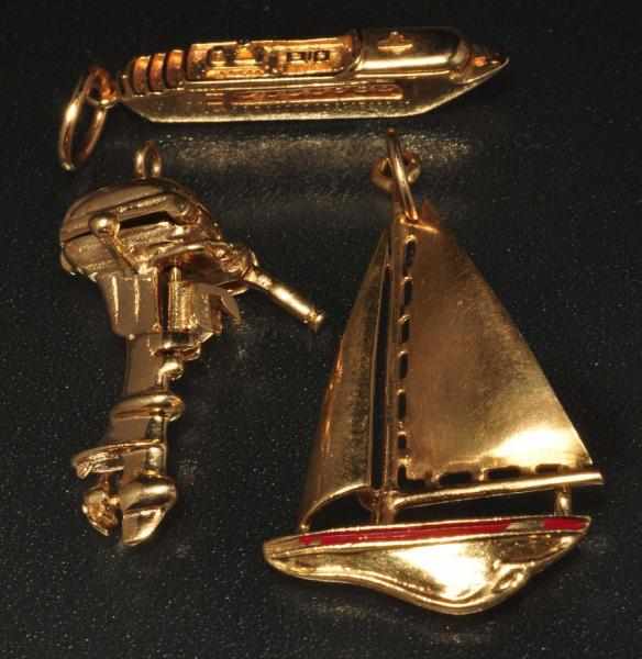 Appraisal: Lot of K Y Gold Charms Description Includes one sailboat