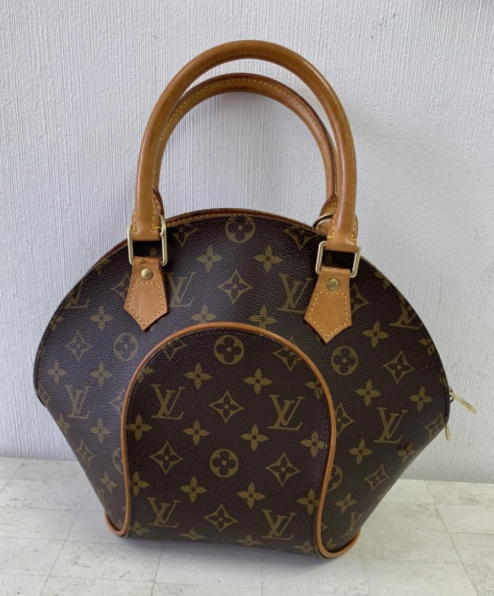 Appraisal: LOUIS VUITTON BROWN NOE HANDBAGLouis Vuitton brown Noe handbag PM