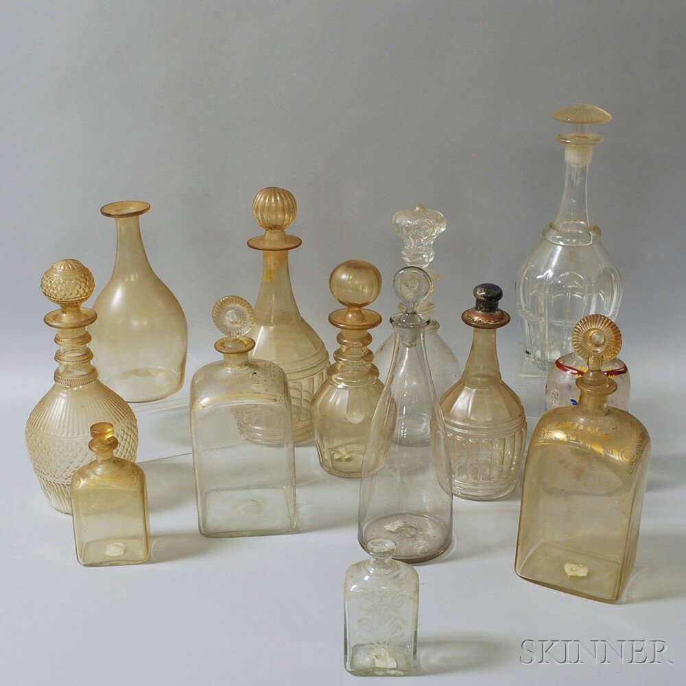 Appraisal: Thirteen Glass Decanters and Bottles including a foliate-enameled flask with