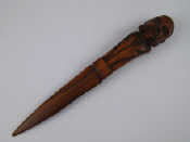 Appraisal: A carved olivewood letter opener with the bust of a