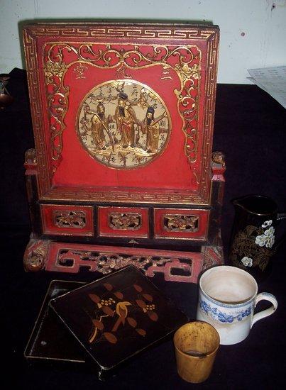 Appraisal: An Oriental carved wood table screen cm wide a lacquer