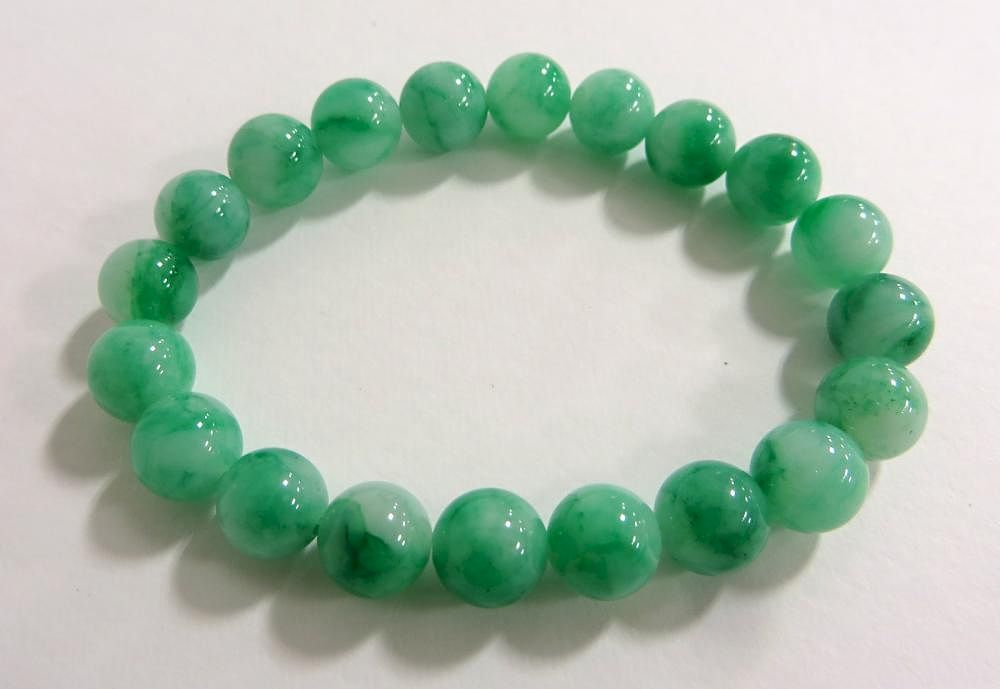 Appraisal: Jadeite Bead Bracelet Jadeite Bead Bracelet Description Jadeite bracelet made