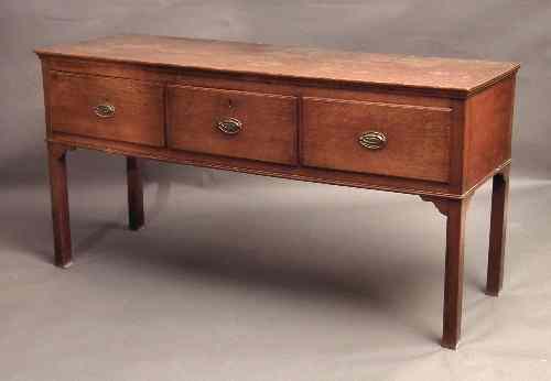 Appraisal: A late th Century oak dresser base the plain top