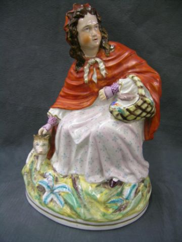 Appraisal: Large Staffordshire Red Riding Hood and Wolf tall the largest