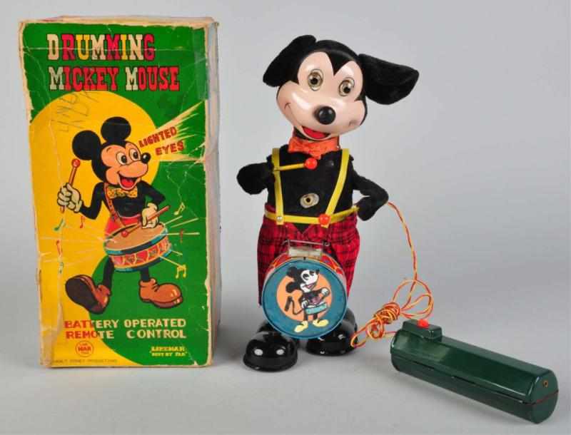 Appraisal: Walt Disney Drumming Mickey Mouse Battery-Op Toy Remote control Toy