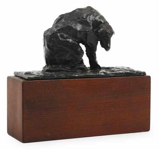 Appraisal: Rick Amor born The Dog bronze with wooden base signature