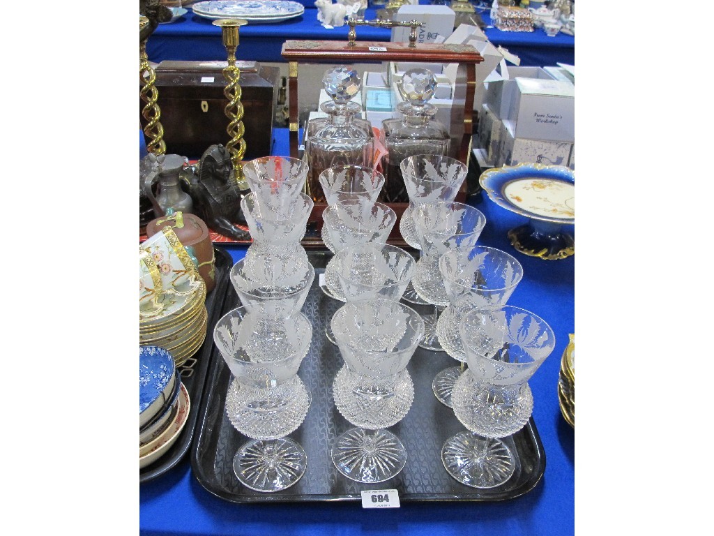 Appraisal: Twelve Edinburgh crystal thistle wine glasses and a tantalus with