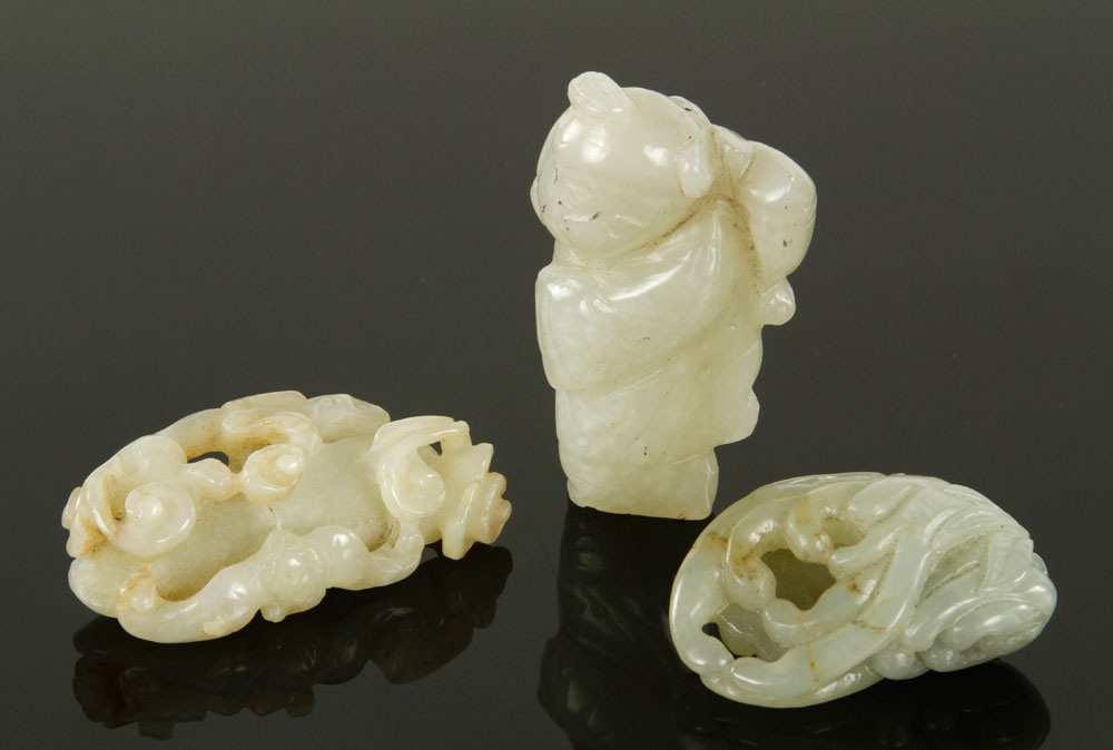 Appraisal: - Three Chinese Jade Pendants Three pieces of carved jade