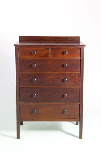 Appraisal: GUSTAV STICKLEY Chest of drawers in two-over-four configuration with round