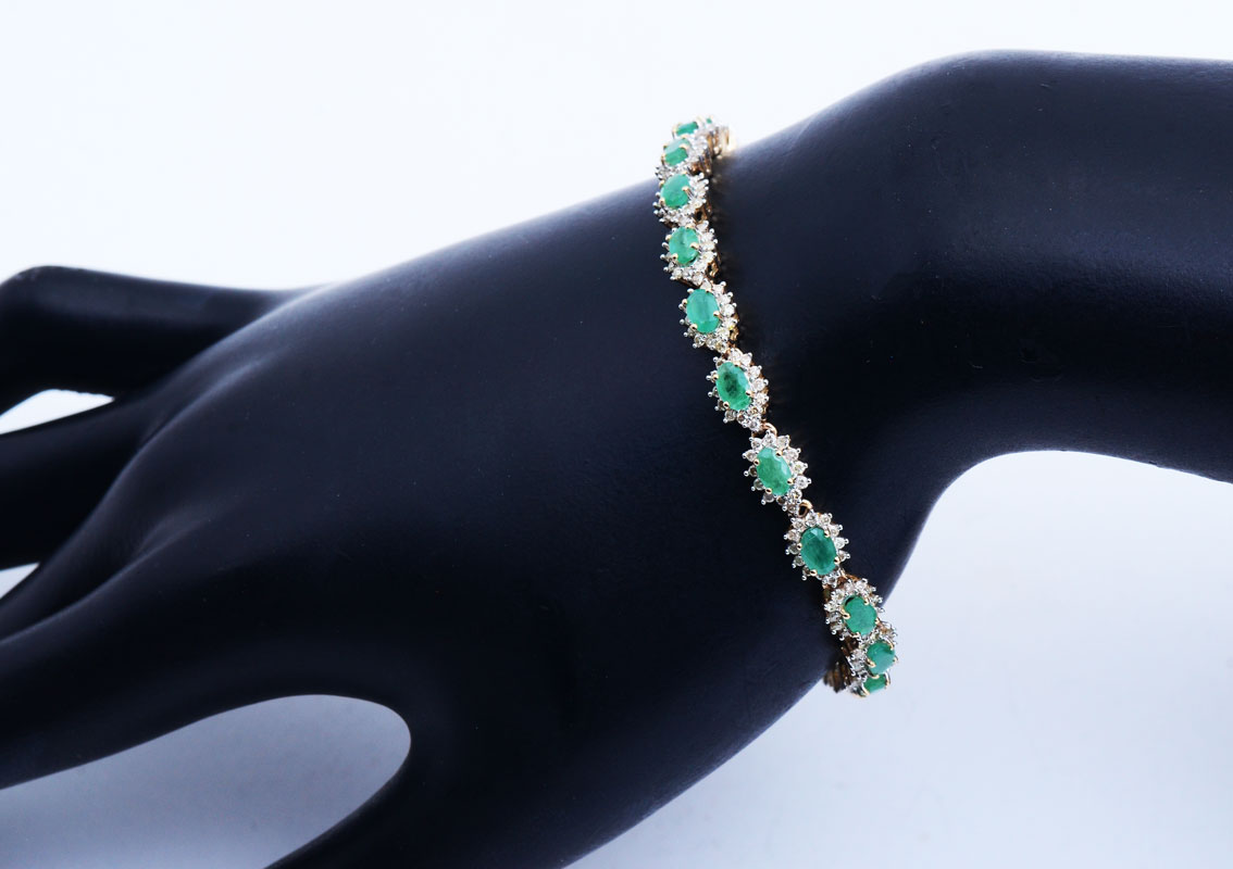 Appraisal: K CT EMERALD AND DIAMOND BRACELET K yellow gold plays