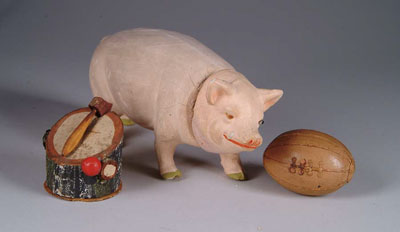 Appraisal: THREE PAPIER-M CH CANDY CONTAINERS A little porker in length