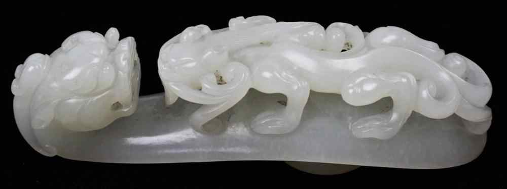 Appraisal: CHINESE WHITE JADE GIRDLE HOOK of good even pale material