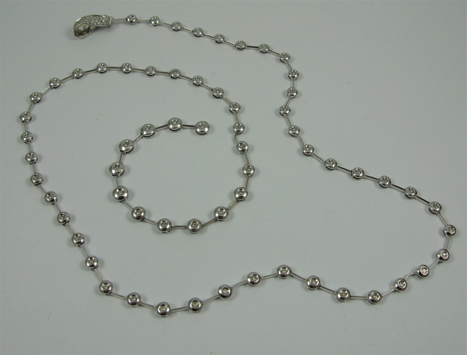 Appraisal: DIAMOND AND K WHITE GOLD NECKLACE - in length and