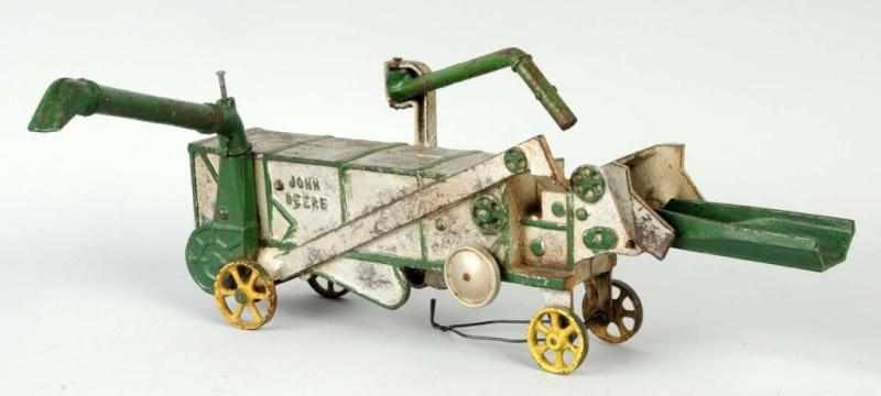 Appraisal: Cast Iron Vindex John Deere Farm Toy Description Rare Embossed