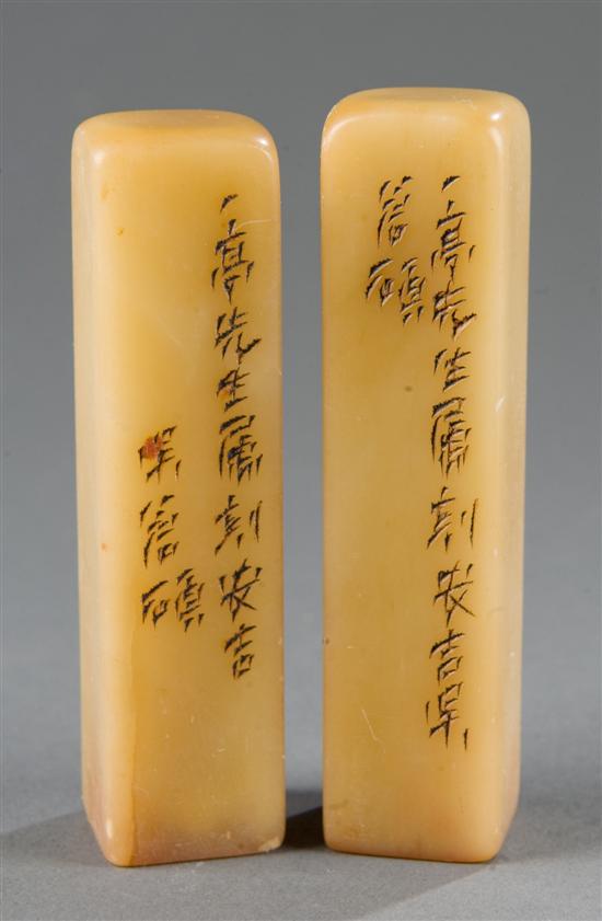 Appraisal: Chinese pair of soapstone seals Rectangular yellow soapstone with carved