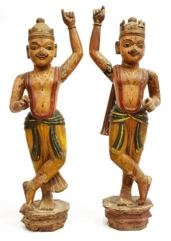 Appraisal: lot of Carved and polychromed temple figures India standing on