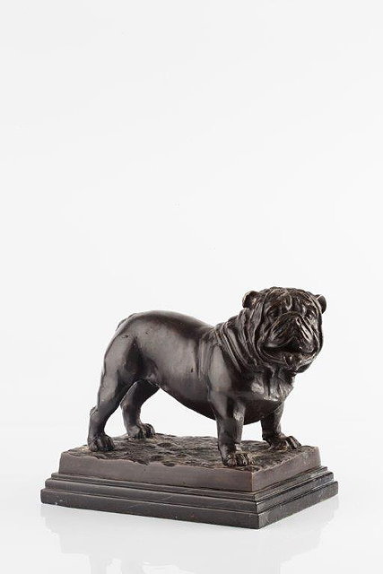 Appraisal: A BRONZE FIGURE OF A BULLDOG standing upon a naturalistic