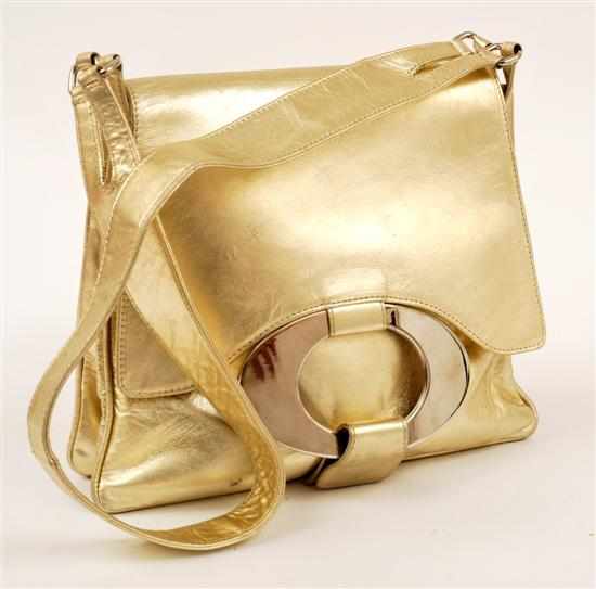 Appraisal: A VINTAGE SHOULDER BAG BY VALENTINO Styled in brushed gold