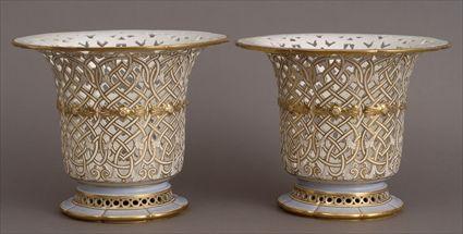 Appraisal: PAIR OF SEVRES PORCELAIN OPENWORK VASES Marked S within gray