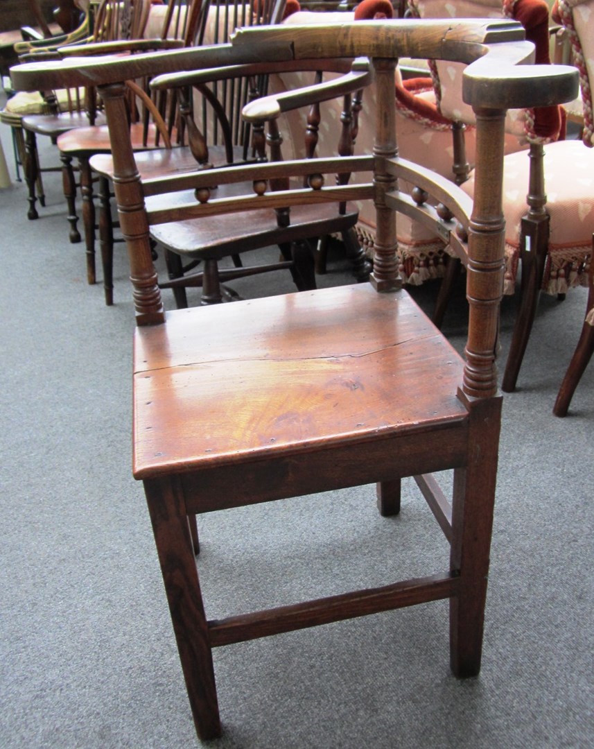 Appraisal: An early th century East Anglian oak corner chair with