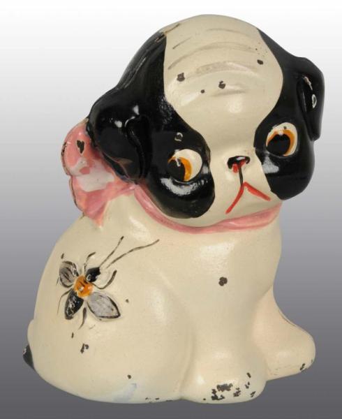 Appraisal: Cast Iron Puppo Still Bank Description Manufactured by Hubley Manufacturing