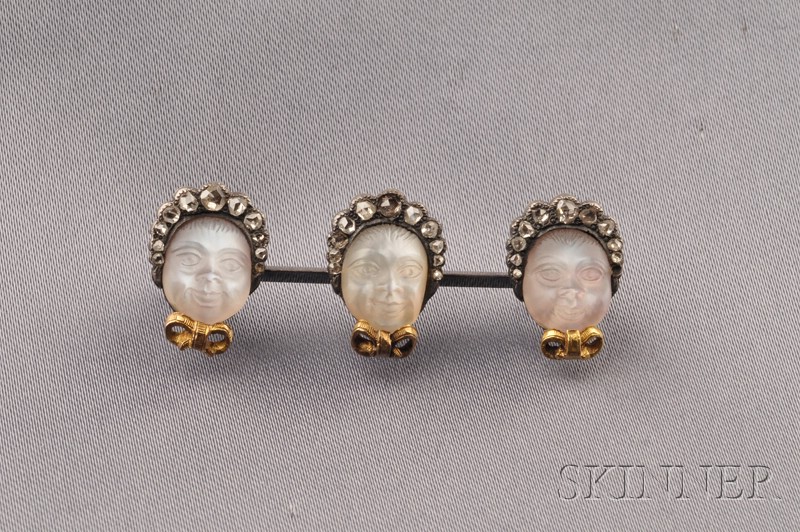 Appraisal: Antique Carved Moonstone and Diamond Bar Pin the three moonstone