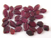 Appraisal: A quantity of drilled garnet beads approx carats VAT will