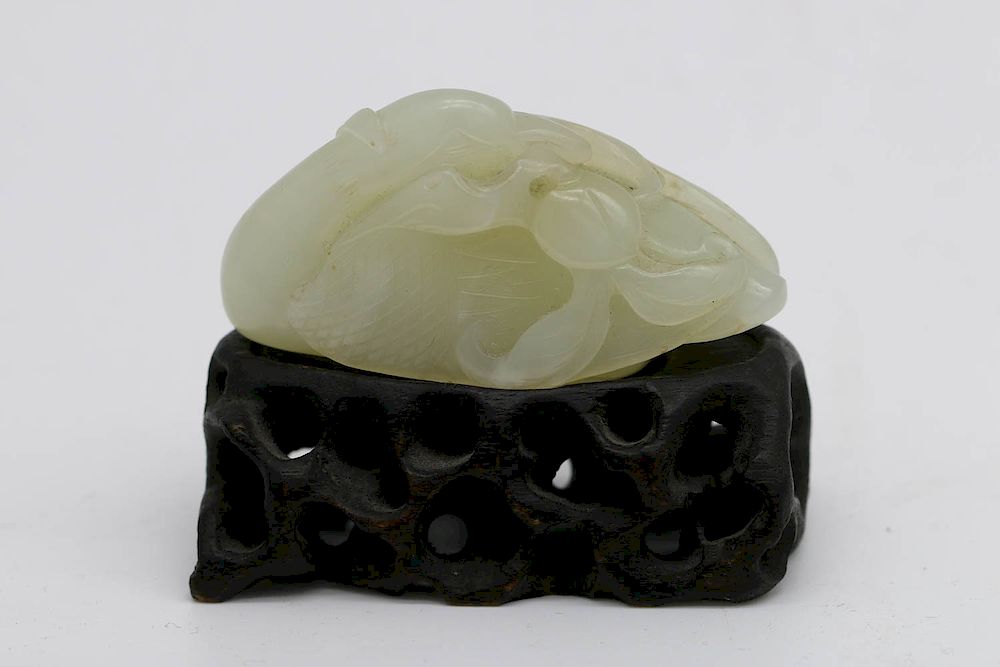 Appraisal: FINE WHITE JADE GOOD AND PEACH GROUP Depicting vividly a