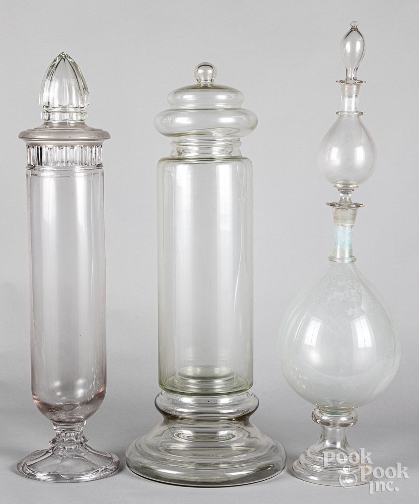 Appraisal: Colorless glass apothecary show globes Three large colorless glass apothecary