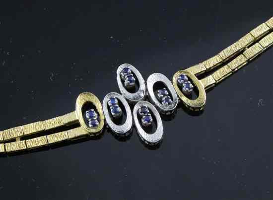 Appraisal: An ct two colour gold and sapphire textured link bracelet