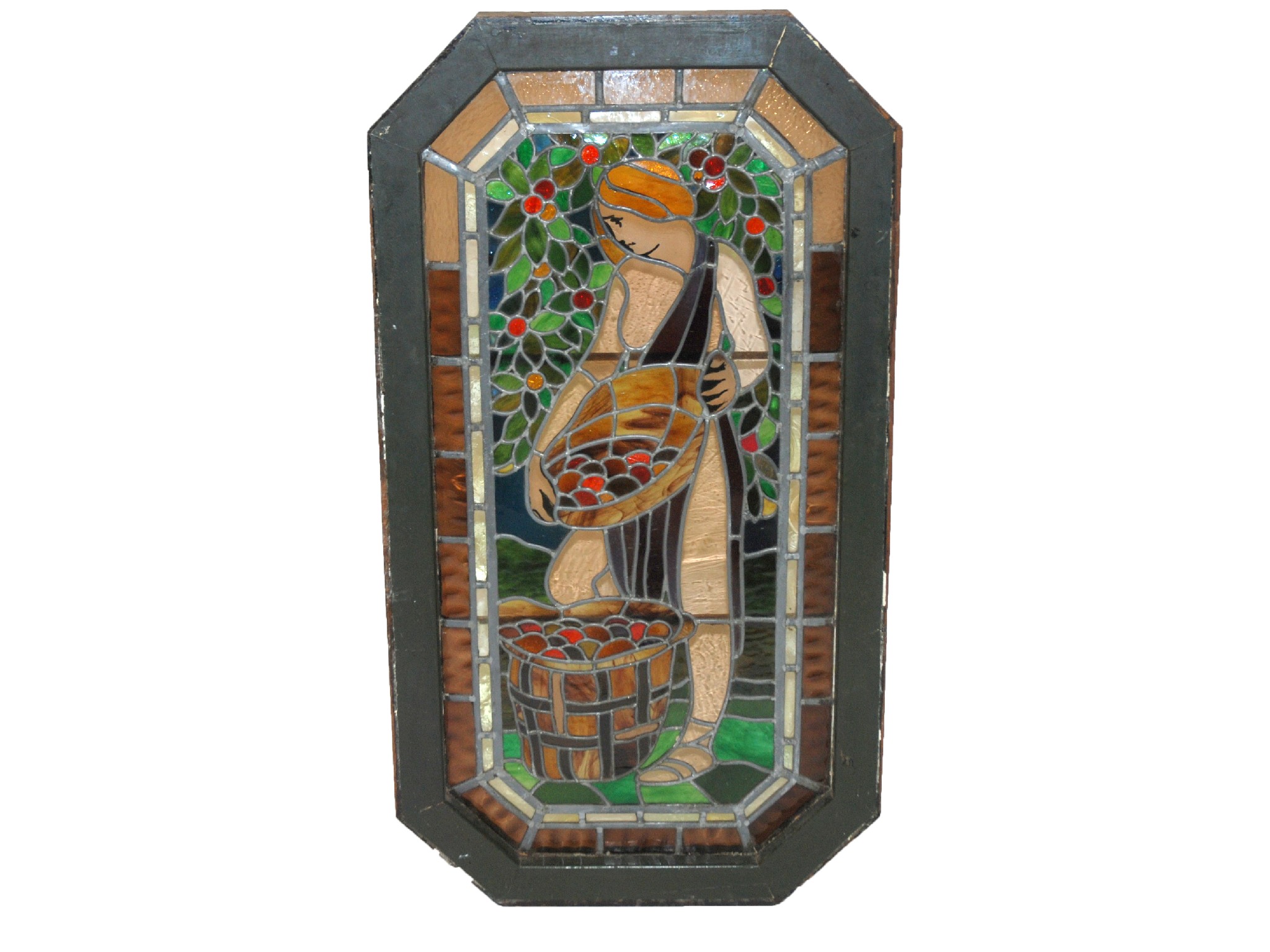 Appraisal: A stained and leaded glass windowdesigned as Autumn holding a