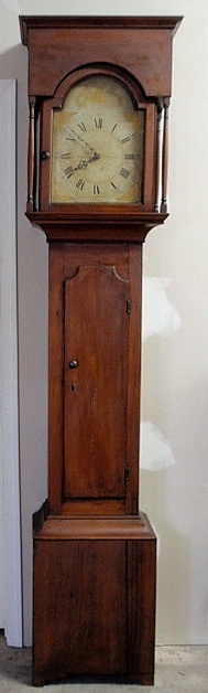 Appraisal: Connecticut walnut tall case clock with a flat top dovetailed