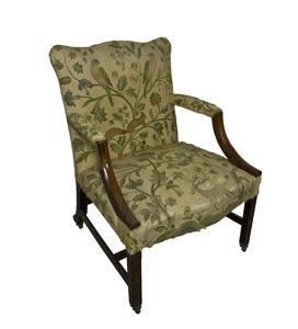 Appraisal: A George III mahogany library armchair on moulded and chamfered