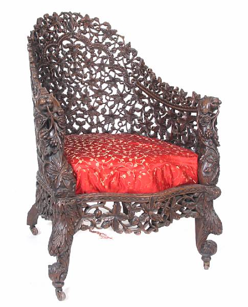 Appraisal: An Anglo Indian carved wood armchair th century height in